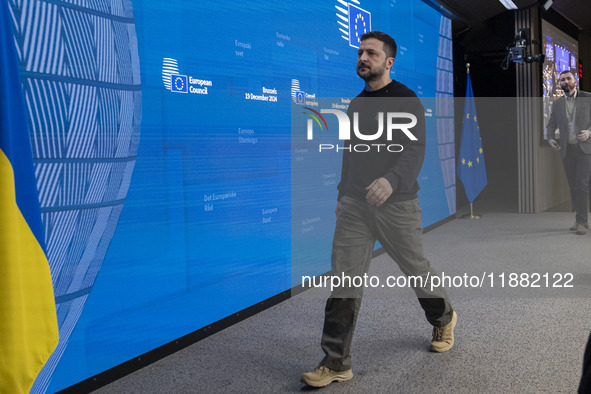 President of Ukraine Volodymyr Zelenskyy departs from a press conference during his visit in Brussels and the European Council Summit, the E...