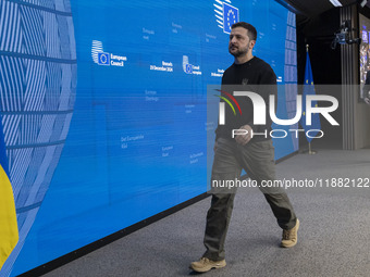 President of Ukraine Volodymyr Zelenskyy departs from a press conference during his visit in Brussels and the European Council Summit, the E...