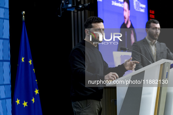 President of Ukraine Volodymyr Zelenskyy addresses a press conference during his visit at the European Council Summit, the EU leaders meetin...