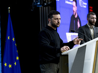 President of Ukraine Volodymyr Zelenskyy addresses a press conference during his visit at the European Council Summit, the EU leaders meetin...