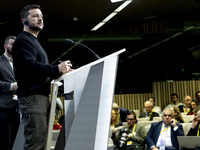 President of Ukraine Volodymyr Zelenskyy addresses a press conference during his visit at the European Council Summit, the EU leaders meetin...