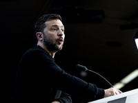 President of Ukraine Volodymyr Zelenskyy addresses a press conference during his visit at the European Council Summit, the EU leaders meetin...