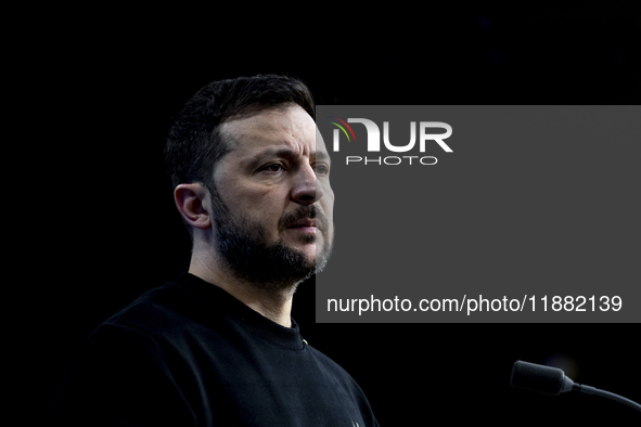 President of Ukraine Volodymyr Zelenskyy addresses a press conference during his visit at the European Council Summit, the EU leaders meetin...