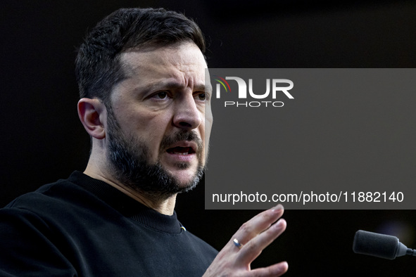 President of Ukraine Volodymyr Zelenskyy addresses a press conference during his visit at the European Council Summit, the EU leaders meetin...