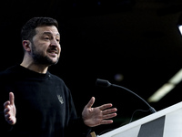 President of Ukraine Volodymyr Zelenskyy addresses a press conference during his visit at the European Council Summit, the EU leaders meetin...