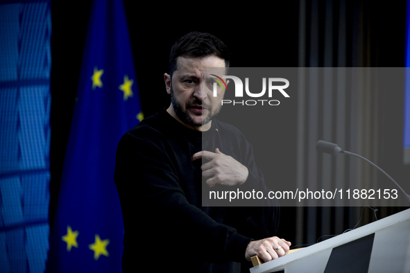 President of Ukraine Volodymyr Zelenskyy addresses a press conference during his visit at the European Council Summit, the EU leaders meetin...