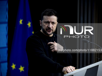 President of Ukraine Volodymyr Zelenskyy addresses a press conference during his visit at the European Council Summit, the EU leaders meetin...