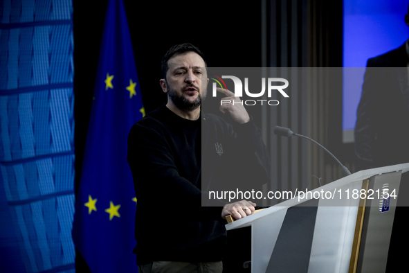 President of Ukraine Volodymyr Zelenskyy addresses a press conference during his visit at the European Council Summit, the EU leaders meetin...