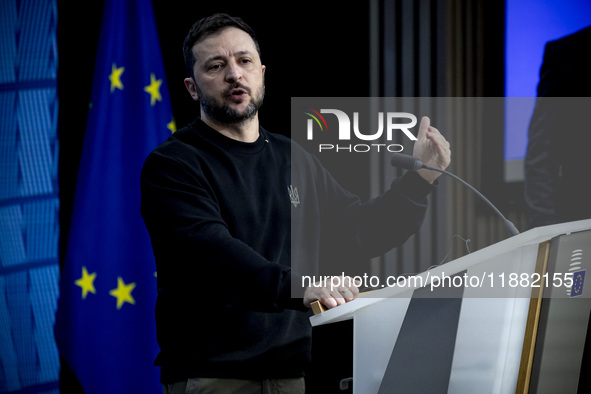 President of Ukraine Volodymyr Zelenskyy addresses a press conference during his visit at the European Council Summit, the EU leaders meetin...