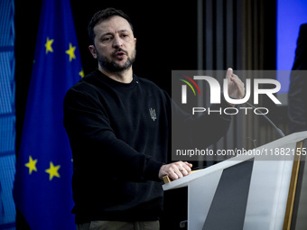 President of Ukraine Volodymyr Zelenskyy addresses a press conference during his visit at the European Council Summit, the EU leaders meetin...