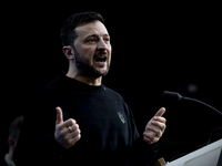 President of Ukraine Volodymyr Zelenskyy addresses a press conference during his visit at the European Council Summit, the EU leaders meetin...