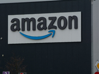 The Amazon logo is seen at a site in Werne, Germany, on December 19, 2024, as the Verdi labor union calls for a strike and demands collectiv...