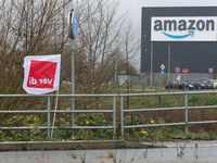 A Verdi flag is placed in front of an Amazon site in Werne, Germany, on December 19, 2024, as the Verdi labor union calls for a strike and d...