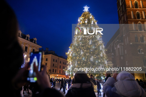 The Christmas tree, which has been recognized by Time Out magazine as the most beautiful in the world., is seen at the Main Square in Krakow...