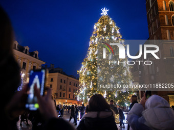 The Christmas tree, which has been recognized by Time Out magazine as the most beautiful in the world., is seen at the Main Square in Krakow...