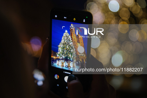 The Christmas tree, which has been recognized by Time Out magazine as the most beautiful in the world., is seen at the Main Square in Krakow...