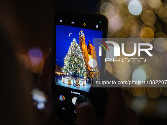 The Christmas tree, which has been recognized by Time Out magazine as the most beautiful in the world., is seen at the Main Square in Krakow...