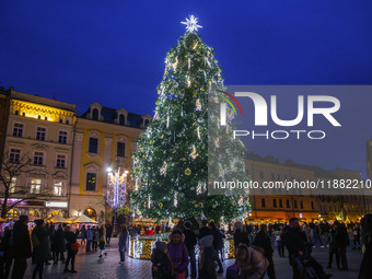 The Christmas tree, which has been recognized by Time Out magazine as the most beautiful in the world., is seen at the Main Square in Krakow...