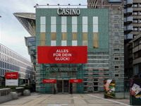 The facade of Casino Innsbruck with its red banner 'Alles fur dein Gluck!' ('Everything for your luck!') is displayed alongside promotional...