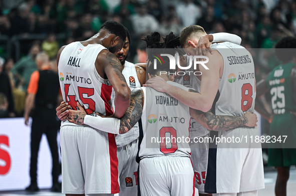 Players of Baskonia Vitoria-Gasteiz pray for Mathias Lessort after he gets injured during the Euroleague, Round 17 match between Panathinaik...