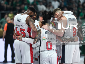 Players of Baskonia Vitoria-Gasteiz pray for Mathias Lessort after he gets injured during the Euroleague, Round 17 match between Panathinaik...