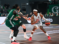 Chima Moneke of Baskonia Vitoria-Gasteiz competes with Mathias Lessort and Juancho Hernangomez of Panathinaikos AKTOR Athens during the Euro...