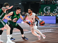 Markus Howard of Baskonia Vitoria-Gasteiz competes with Panagiotis Kalaitzakis of Panathinaikos AKTOR Athens during the Euroleague, Round 17...