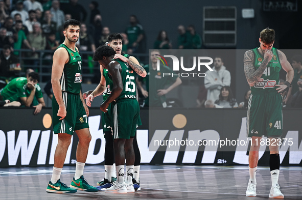 Players of Panathinaikos AKTOR Athens pray for Mathias Lessort after he gets injured during the Euroleague, Round 17 match between Panathina...