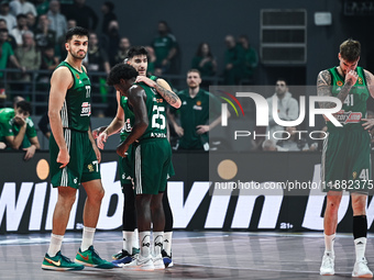 Players of Panathinaikos AKTOR Athens pray for Mathias Lessort after he gets injured during the Euroleague, Round 17 match between Panathina...