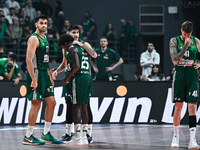 Players of Panathinaikos AKTOR Athens pray for Mathias Lessort after he gets injured during the Euroleague, Round 17 match between Panathina...