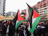 Demonstrators participate in the 62nd Saturday of the demonstration in support of Palestine in the Corvetto district in Milan, Italy, on Dec...