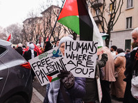 Demonstrators participate in the 62nd Saturday of the demonstration in support of Palestine in the Corvetto district in Milan, Italy, on Dec...