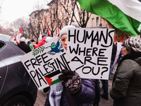 Demonstrators participate in the 62nd Saturday of the demonstration in support of Palestine in the Corvetto district in Milan, Italy, on Dec...