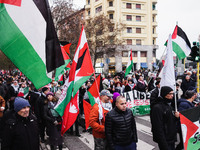 Demonstrators participate in the 62nd Saturday of the demonstration in support of Palestine in the Corvetto district in Milan, Italy, on Dec...