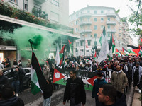 Demonstrators participate in the 62nd Saturday of the demonstration in support of Palestine in the Corvetto district in Milan, Italy, on Dec...