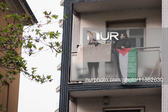 Demonstrators participate in the 62nd Saturday of the demonstration in support of Palestine in the Corvetto district in Milan, Italy, on Dec...