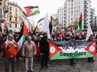 Demonstrators participate in the 62nd Saturday of the demonstration in support of Palestine in the Corvetto district in Milan, Italy, on Dec...