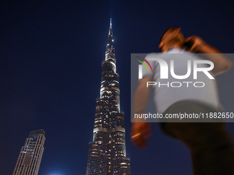 Evening view on Burj Khalifa in Dubai, United Arab Emirates on November 29, 2023.  (