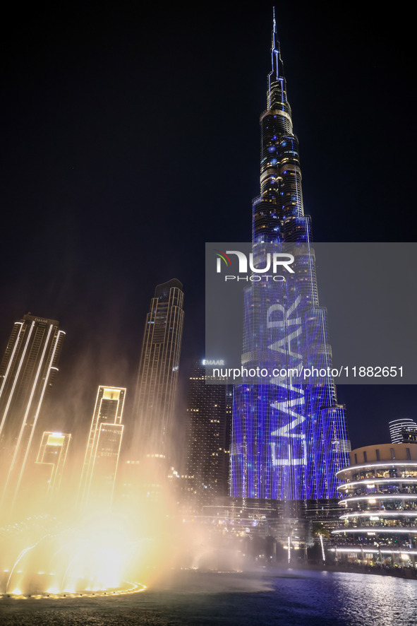 Evening view on Burj Khalifa building with Emaar Properties name in Dubai, United Arab Emirates on November 29, 2023.  