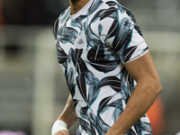 Joelinton warms up during the Carabao Cup Quarter Final match between Newcastle United and Brentford at St. James's Park in Newcastle, Unite...