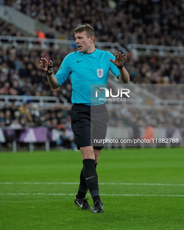 Match referee Samuel Barrott officiates during the Carabao Cup Quarter Final match between Newcastle United and Brentford at St. James's Par...