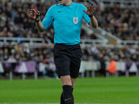 Match referee Samuel Barrott officiates during the Carabao Cup Quarter Final match between Newcastle United and Brentford at St. James's Par...