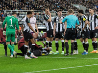 Newcastle United's Joelinton receives treatment for a facial wound during the Carabao Cup Quarter Final match between Newcastle United and B...