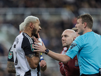 Newcastle United's Joelinton receives treatment for a facial wound during the Carabao Cup Quarter Final match between Newcastle United and B...