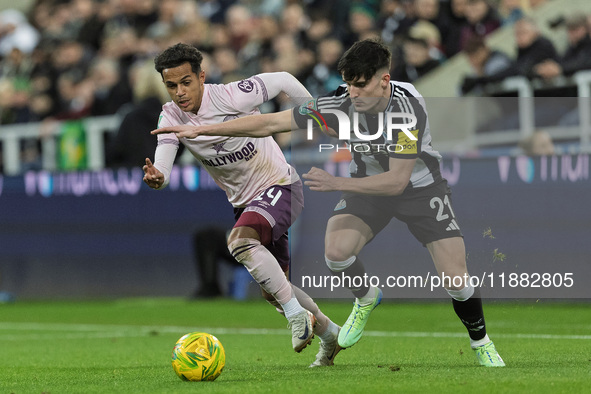 Tino Livramento of Newcastle United competes with Fabio Carvalho of Brentford during the Carabao Cup Quarter Final match between Newcastle U...