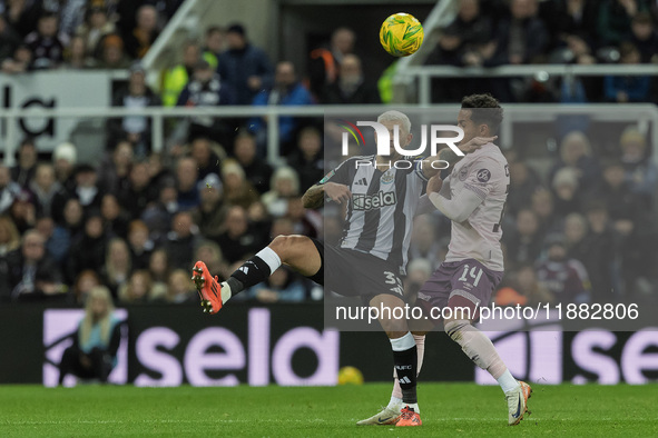 Bruno Guimaraes of Newcastle United competes with Fabio Carvalho of Brentford during the Carabao Cup Quarter Final match between Newcastle U...