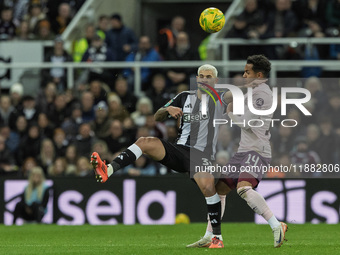 Bruno Guimaraes of Newcastle United competes with Fabio Carvalho of Brentford during the Carabao Cup Quarter Final match between Newcastle U...