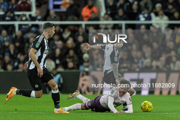 Sandro Tonali of Newcastle United fouls Brentford's Fabio Carvalho during the Carabao Cup Quarter Final match between Newcastle United and B...