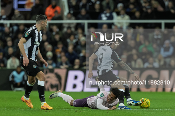 Sandro Tonali of Newcastle United fouls Brentford's Fabio Carvalho during the Carabao Cup Quarter Final match between Newcastle United and B...