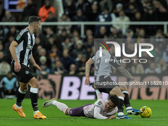 Sandro Tonali of Newcastle United fouls Brentford's Fabio Carvalho during the Carabao Cup Quarter Final match between Newcastle United and B...